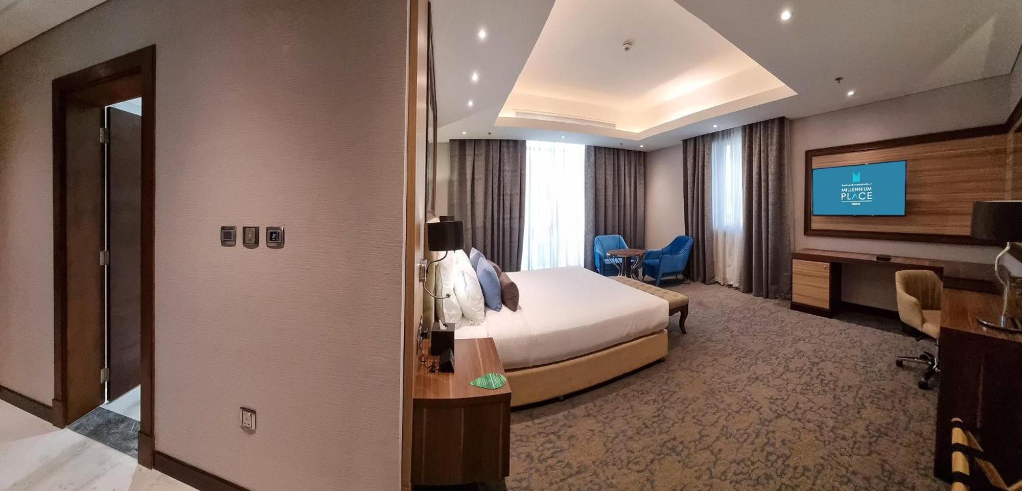 Millennium Place Doha Ngoại thất bức ảnh A bedroom at the hotel